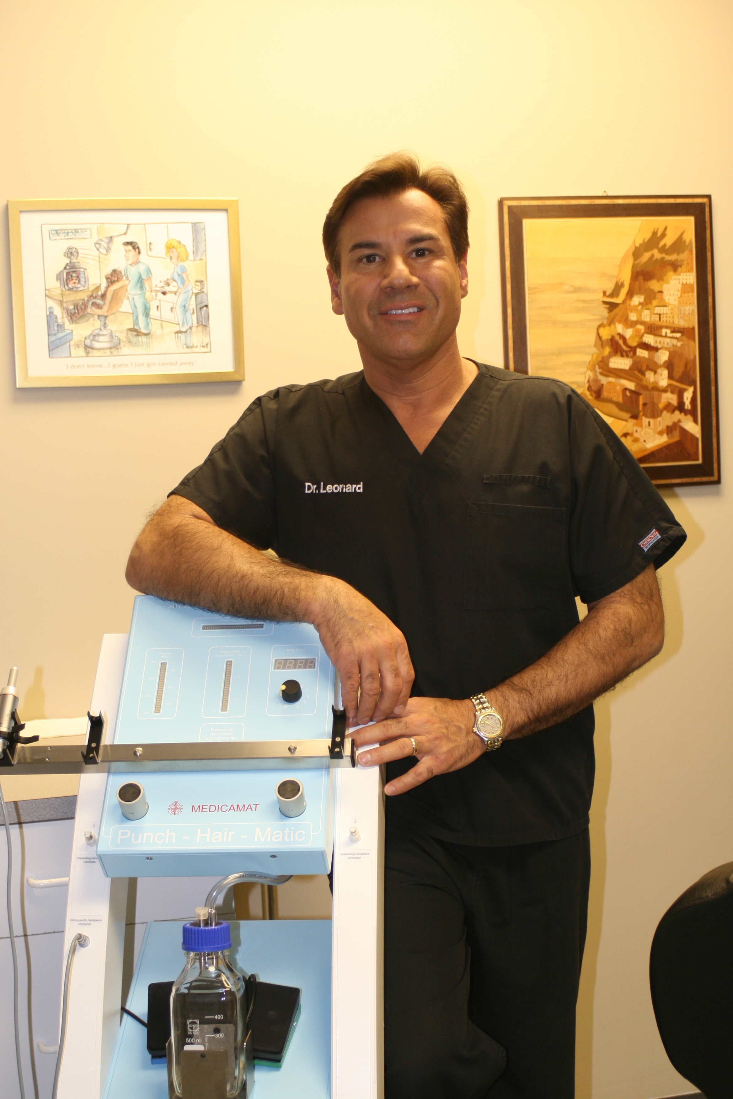 Dr._Leonard_with_NeoGraft_Machine.jpg