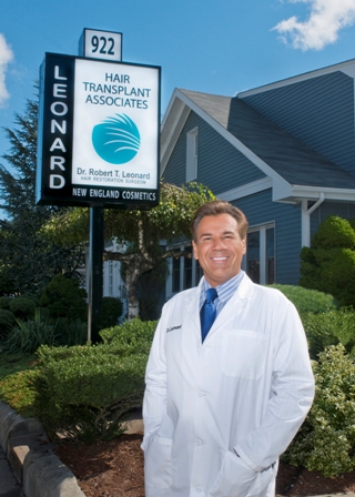 Dr._Leonard_with_sign_Web_V.jpg