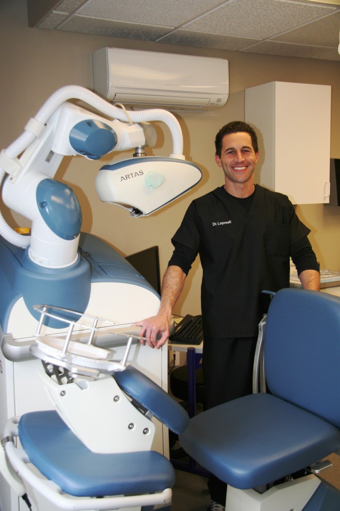 Dr. Lopresti with ARTAS Robotic System