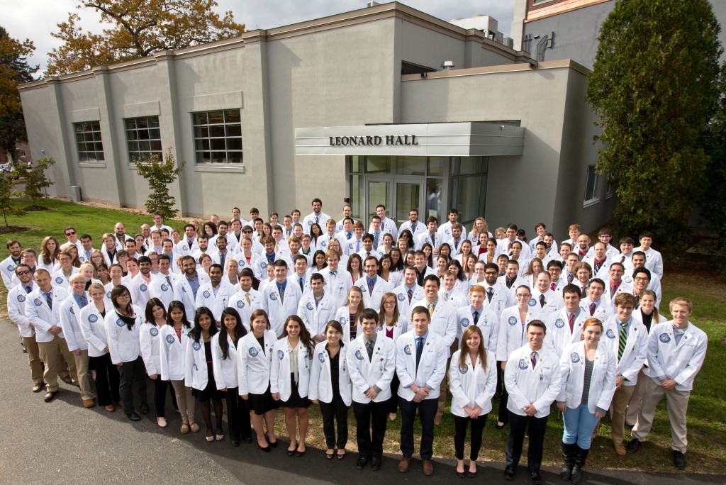 UNE students in front of newly built Leonard Hall.