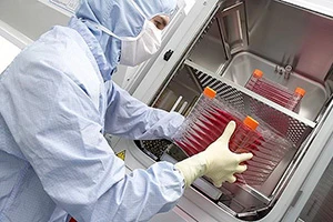 Hair Clone Scientist holding trays